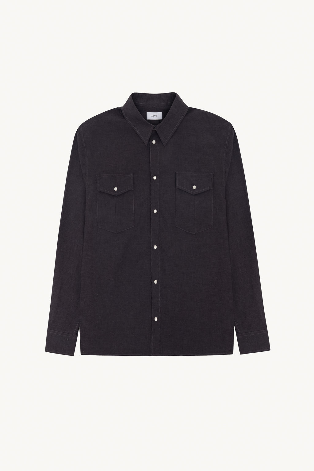 Black shirt with two front pockets on a white background