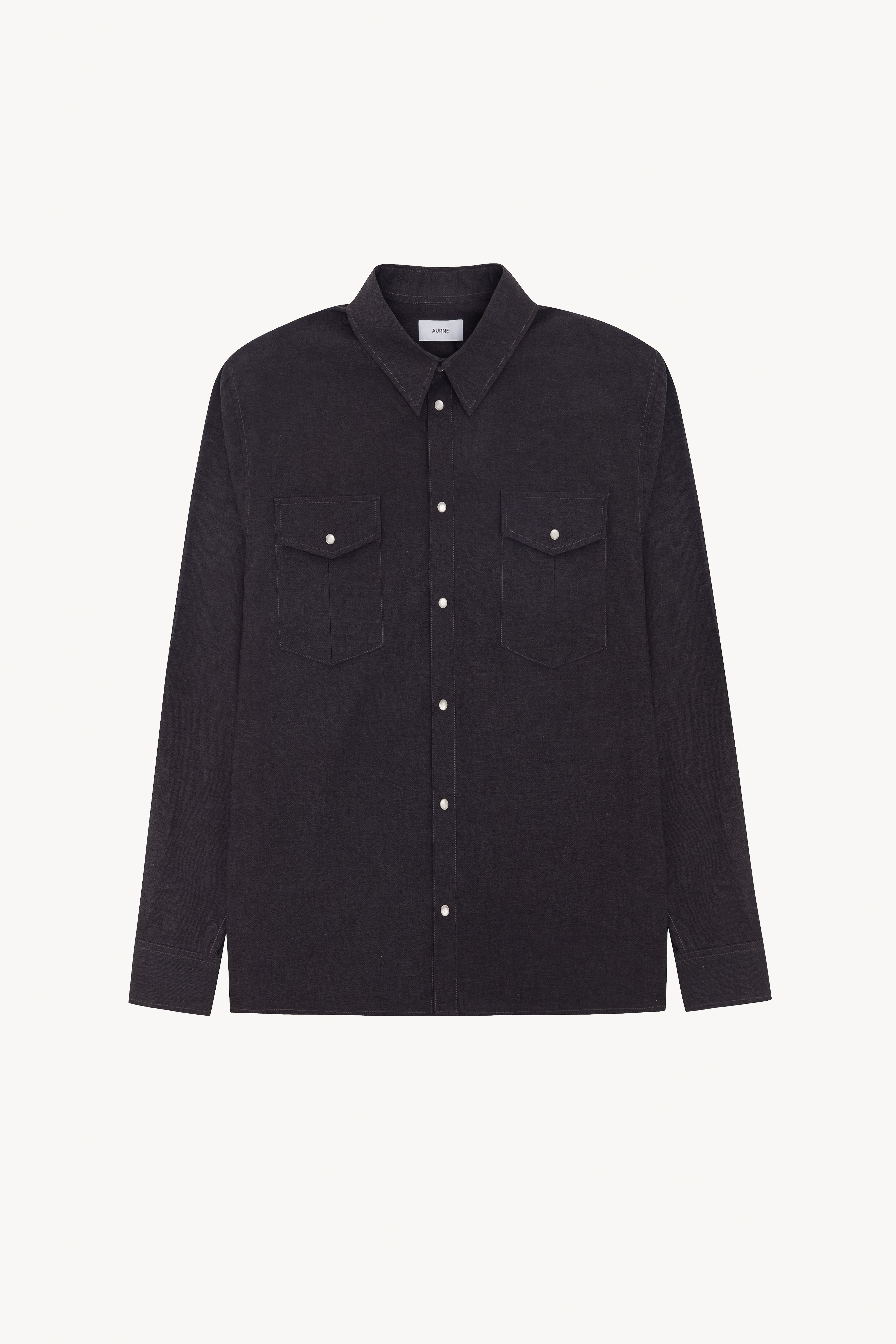 Black shirt with two front pockets on a white background
